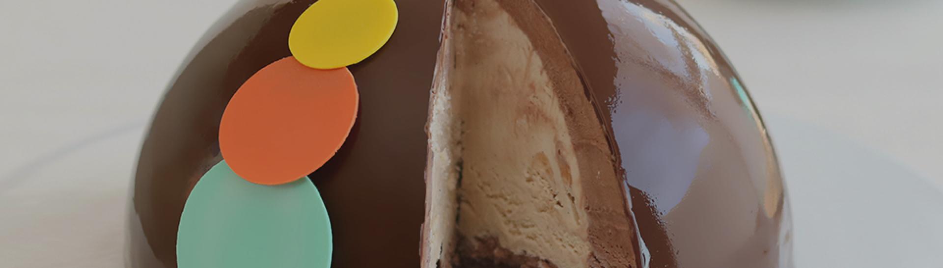 Botolino Zuccotto cake - Dark chocolate semifreddo, white chocolate gelato with candied fruit and almonds Botolino Zuccotto cake - Dark chocolate semifreddo, white chocolate gelato with candied fruit and almonds