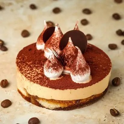 A Botolino mini tiramisu cake dusted with Valrhona cocoa
