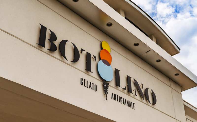 Botolino Gelato Artigianale Preston Hollow location — modern exterior with large branded signage on Royal Lane, Dallas